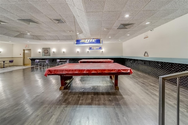 rec room featuring a paneled ceiling, hardwood / wood-style floors, and billiards