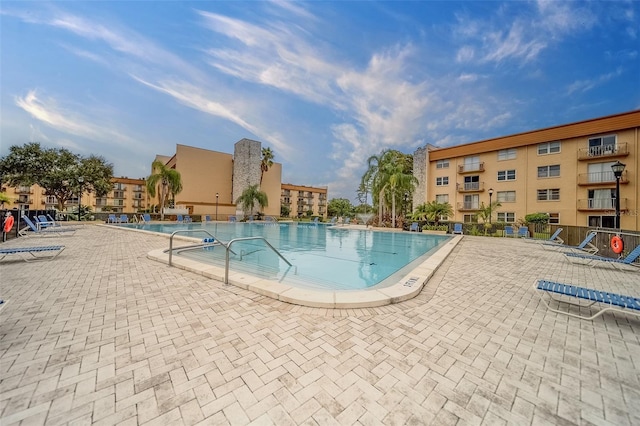 view of pool featuring a patio area