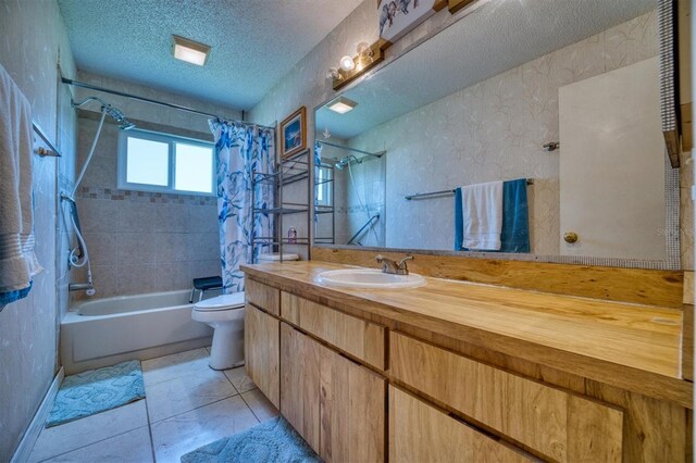 2011 Green Juniper Ln, Brandon, FL 33511 - full bathroom with shower / tub combo with curtain, toilet, a textured ceiling, vanity, and tile patterned floors