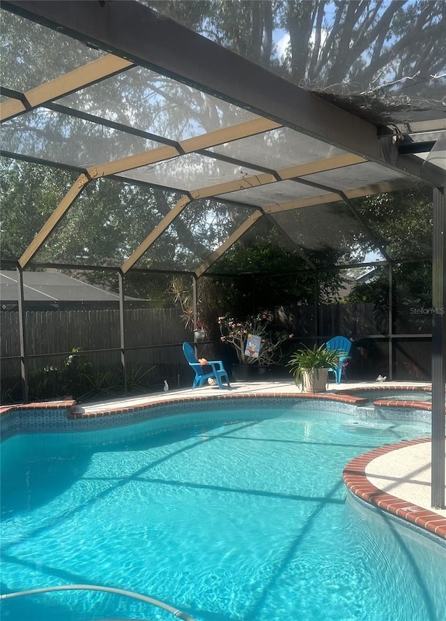 2011 Green Juniper Ln, Brandon, FL 33511 - view of swimming pool with a fenced backyard and a lanai
