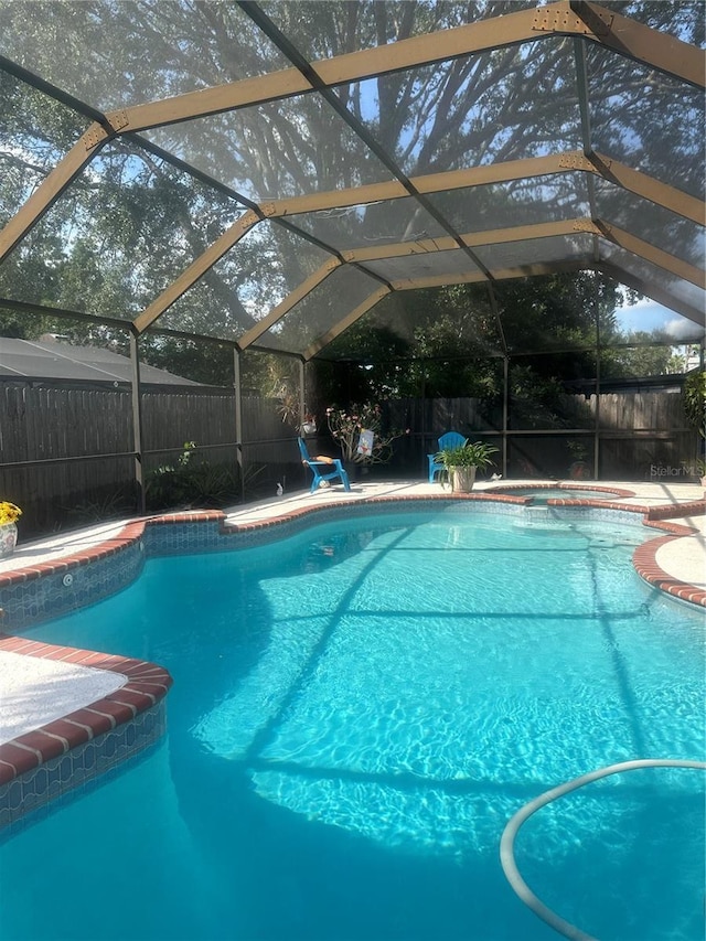 2011 Green Juniper Ln, Brandon, FL 33511 - view of pool featuring a fenced backyard and a lanai