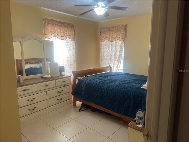2011 Green Juniper Ln, Brandon, FL 33511 - bedroom with light tile patterned floors and a ceiling fan