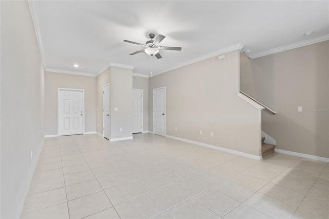 empty room featuring ceiling fan, light tile patterned floors, and crown molding