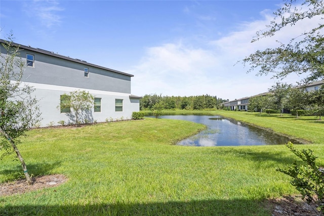 view of yard with a water view