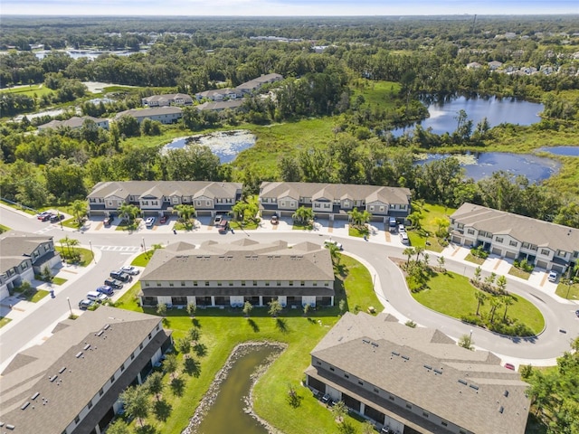 drone / aerial view with a water view