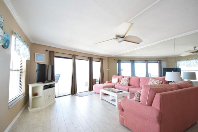 living room featuring light wood-type flooring, ceiling fan, and ornamental molding