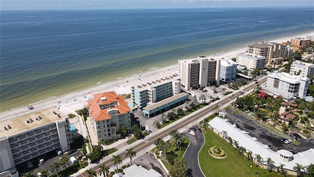 bird's eye view with a water view and a view of the beach