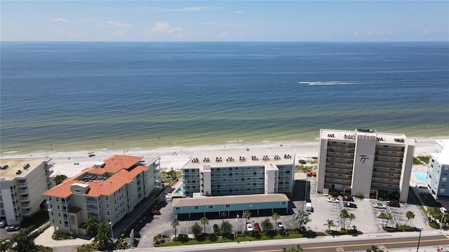 bird's eye view featuring a water view and a view of the beach