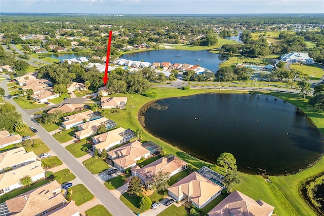 drone / aerial view featuring a water view