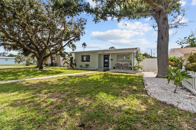 view of front of house with a front lawn