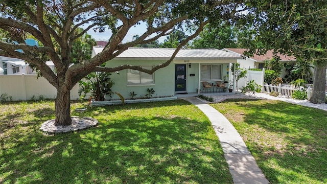 view of front of home with a front yard