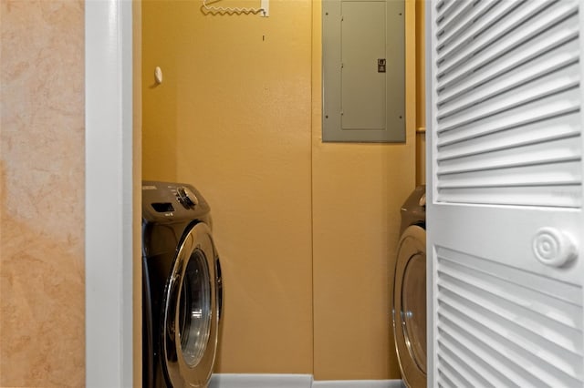 laundry area featuring washer / clothes dryer and electric panel