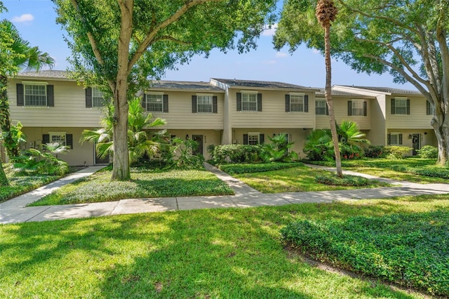 view of front of home with a front yard