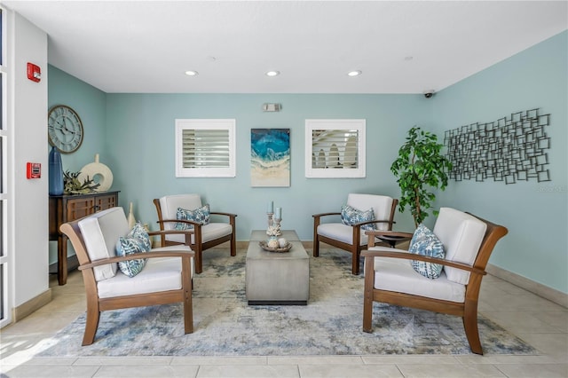 living area featuring light tile patterned flooring