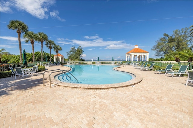 view of pool with a gazebo and a patio area