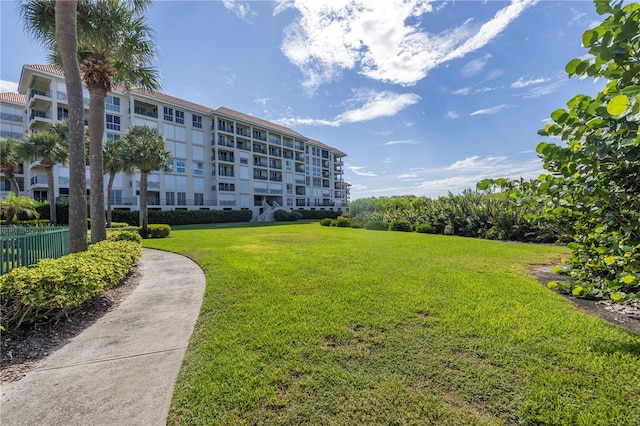 view of community featuring a lawn