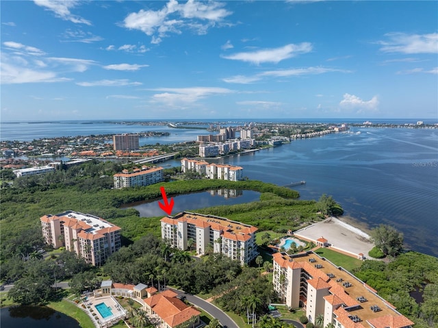 birds eye view of property featuring a water view