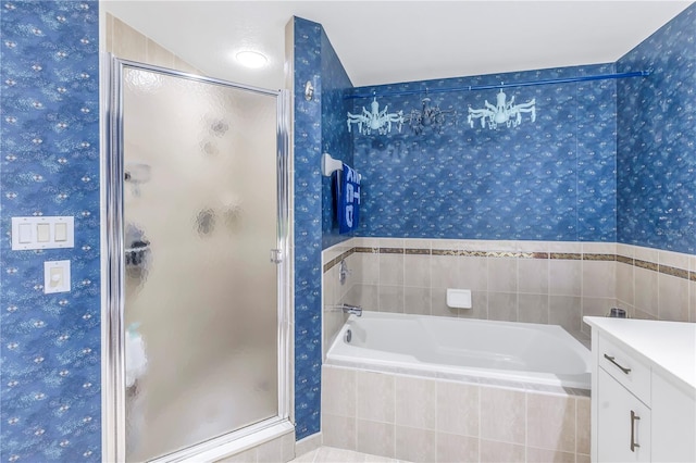 bathroom featuring vanity, tile patterned floors, and independent shower and bath