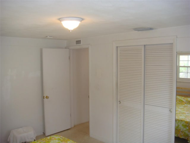 unfurnished bedroom featuring a closet