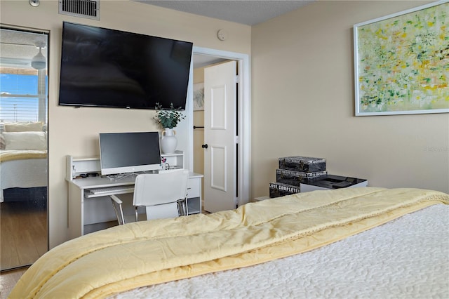 bedroom featuring wood-type flooring