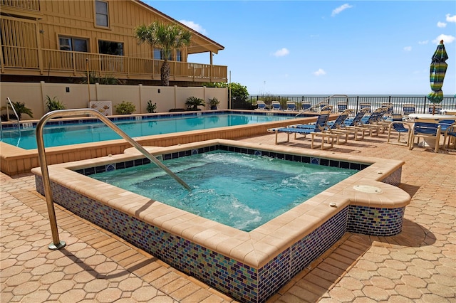 view of pool featuring a community hot tub