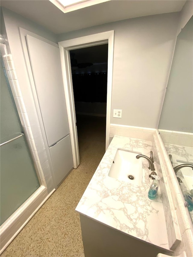 6000 2nd St E Unit 6, St Pete Beach, FL 33706 - bathroom featuring vanity and a shower stall
