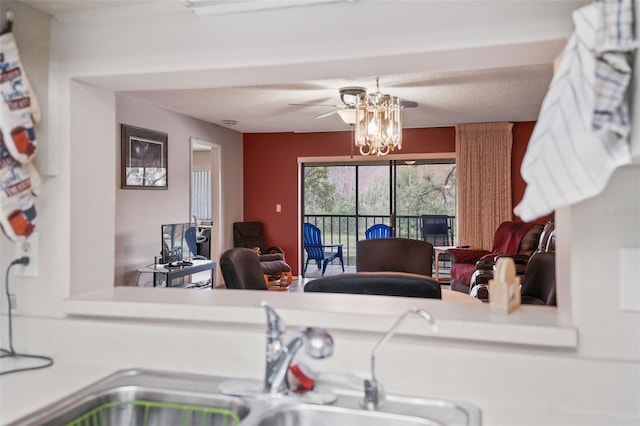 kitchen with a notable chandelier and sink