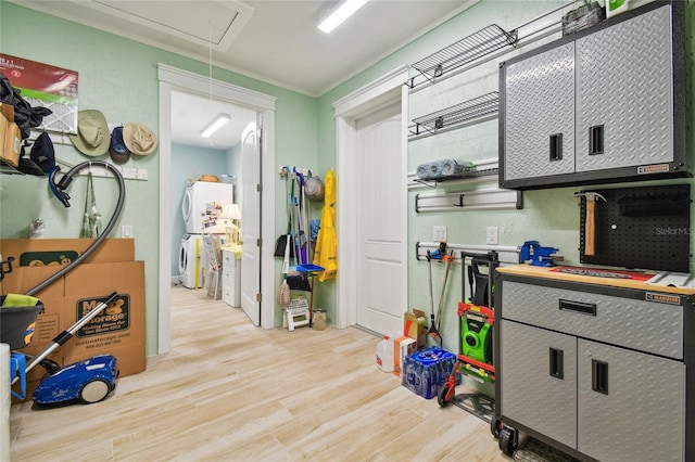 kitchen with light wood-type flooring and ornamental molding