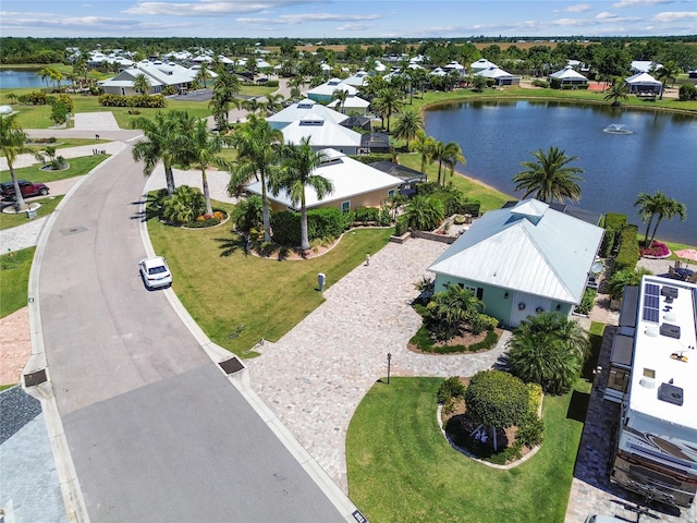 drone / aerial view with a water view