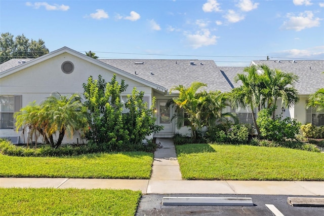 view of front facade with a front yard