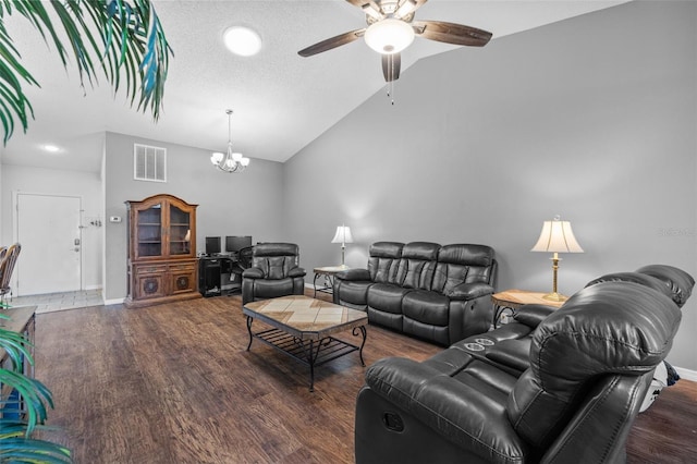 living room with vaulted ceiling, a textured ceiling, ceiling fan with notable chandelier, and dark hardwood / wood-style flooring