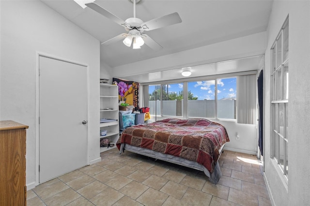 bedroom with vaulted ceiling and ceiling fan