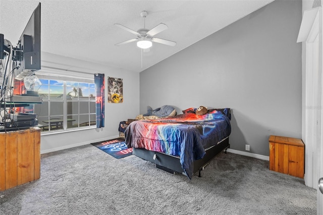 carpeted bedroom featuring ceiling fan, a textured ceiling, and lofted ceiling