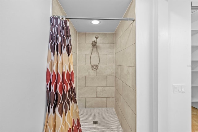 bathroom with tile patterned floors and a shower with curtain