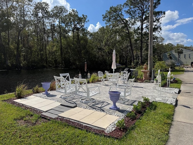 view of patio / terrace featuring a water view