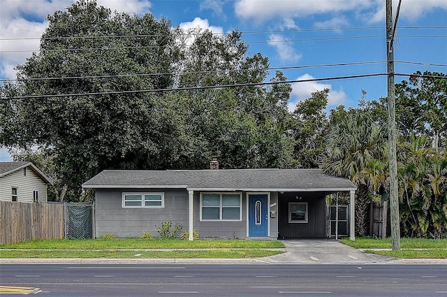 view of front of house featuring a carport