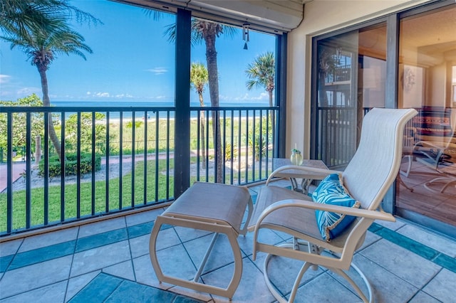 balcony featuring a water view