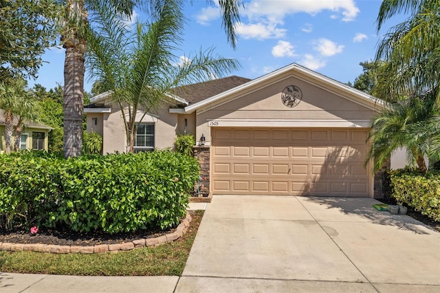 single story home featuring a garage