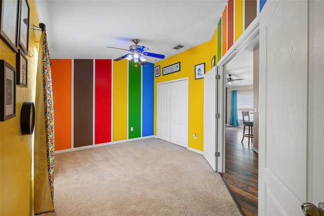 spare room featuring ceiling fan and hardwood / wood-style flooring