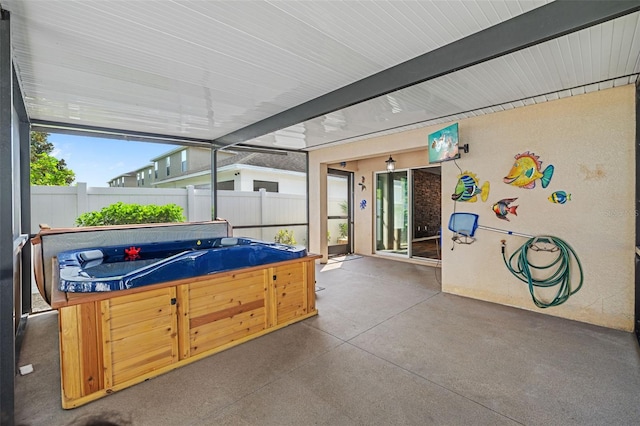 view of patio with a hot tub