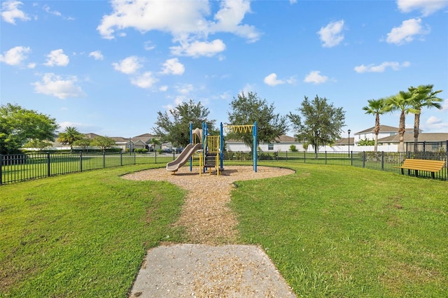 view of play area featuring a lawn