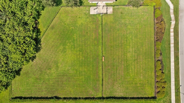 birds eye view of property featuring a rural view