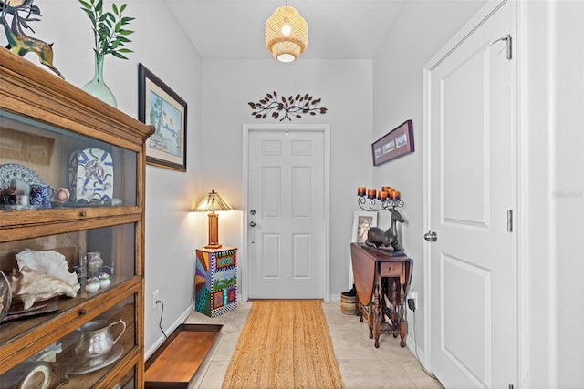 entrance foyer featuring light tile patterned floors