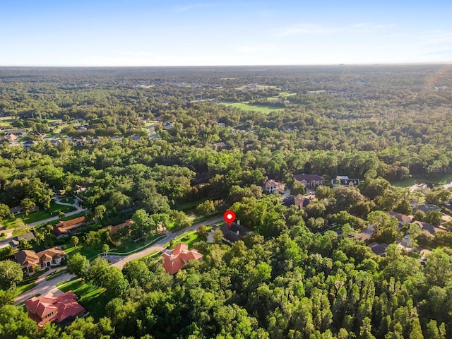 aerial view with a wooded view