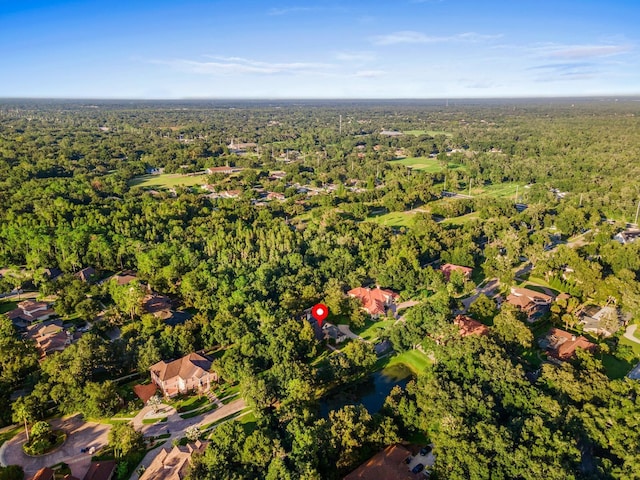 bird's eye view with a view of trees