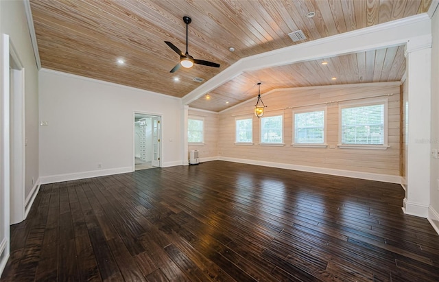 empty room with vaulted ceiling with beams, ceiling fan, dark wood-type flooring, and a wealth of natural light