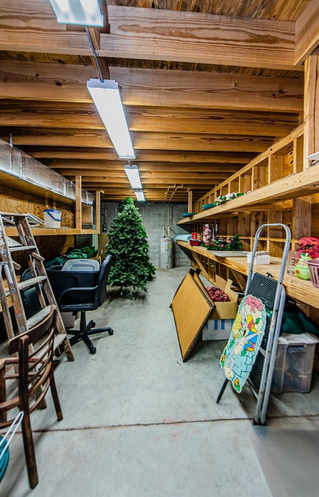 basement featuring electric water heater