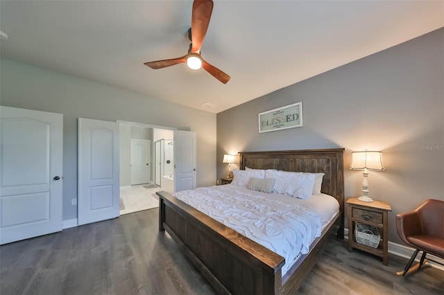 bedroom with ceiling fan and dark hardwood / wood-style floors