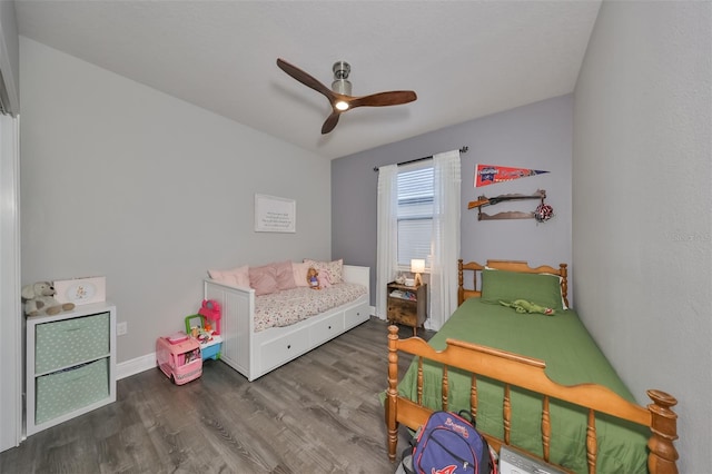 bedroom featuring ceiling fan and hardwood / wood-style floors