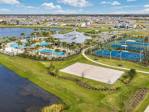 drone / aerial view with a water view